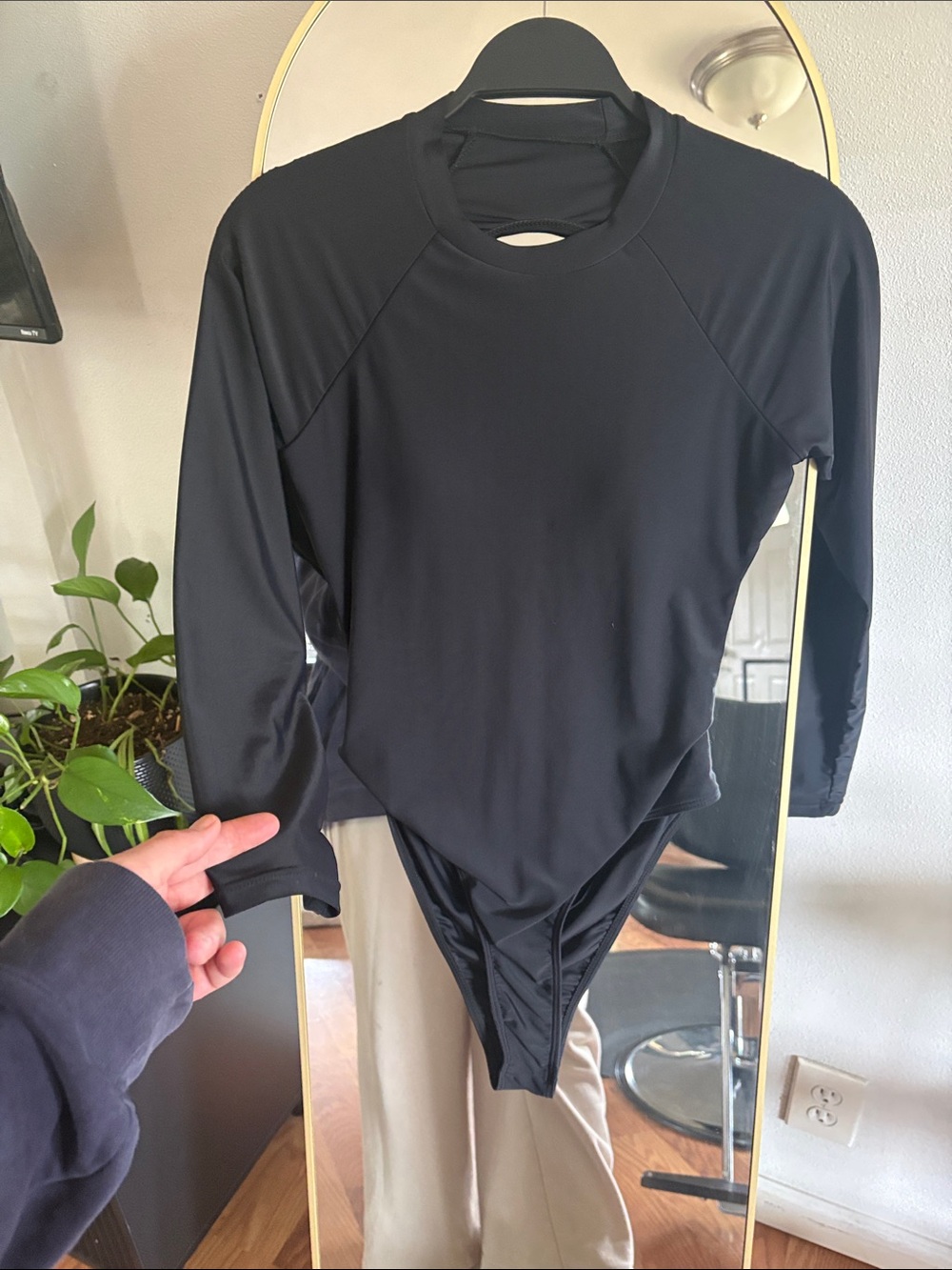 Bathing suit
Women’s Black Long-Sleeve Swim One-Piece